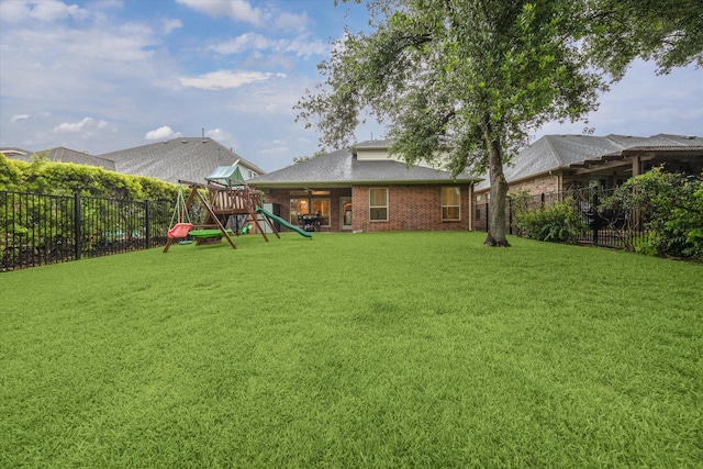 18411 S Raven Shore Dr, Cypress, TX 77433 - fenced backyard featuring a playground