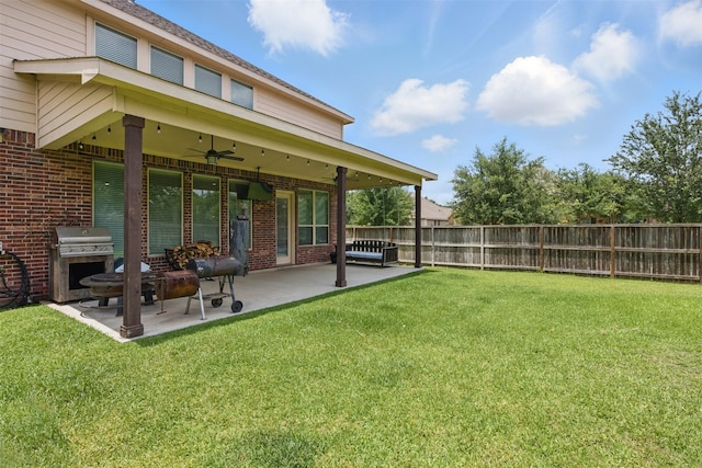2114 Holly Manor Ct, Katy, TX 77493 - view of yard with ceiling fan and a patio area
