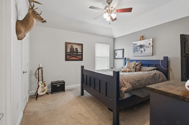 2114 Holly Manor Ct, Katy, TX 77493 - bedroom featuring light carpet, baseboards, a ceiling fan, and lofted ceiling