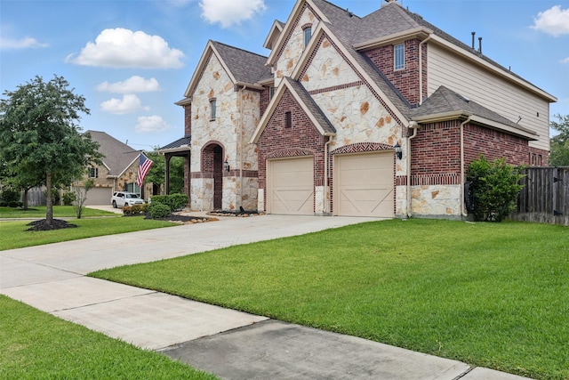 2114 Holly Manor Ct, Katy, TX 77493 - french country style house featuring stone siding, concrete driveway, an attached garage, roof with shingles, and brick siding