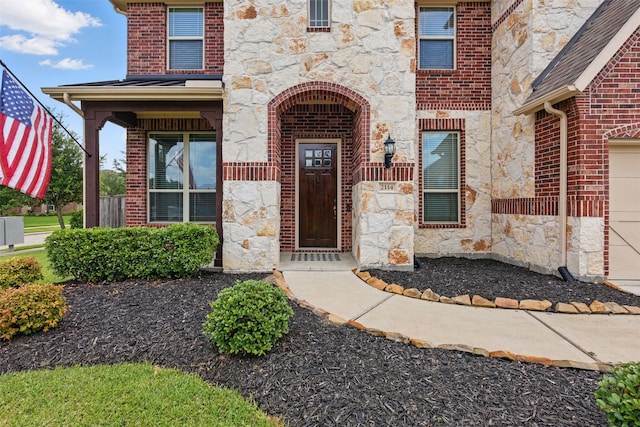 2114 Holly Manor Ct, Katy, TX 77493 - doorway to property with stone siding and brick siding