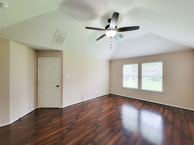 21123 Amber Crossing Dr, Richmond, TX 77406 - spare room featuring lofted ceiling, wood finished floors, a ceiling fan, and baseboards