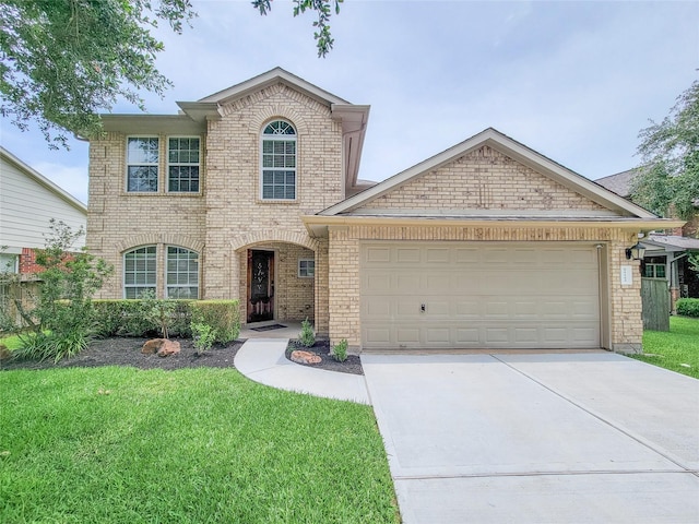 21123 Amber Crossing Dr, Richmond, TX 77406 - traditional home with brick siding, driveway, a front lawn, and an attached garage