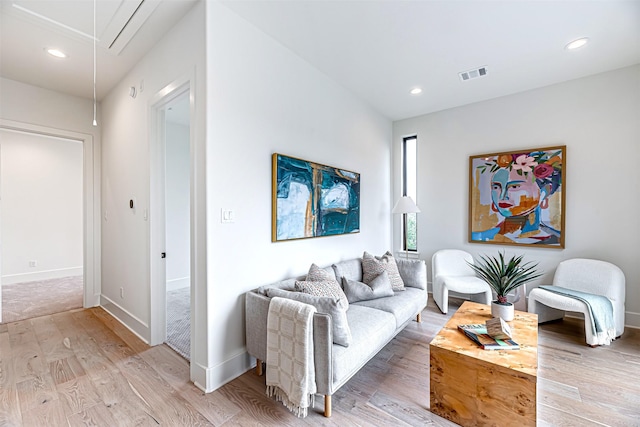 829 Alexander St, Houston, TX 77007 - living area featuring attic access, light wood-style flooring, recessed lighting, and baseboards