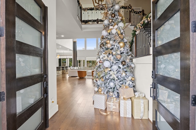 27927 Indigo Ridge Dr, Fulshear, TX 77441 - foyer entrance featuring wood finished floors and a towering ceiling