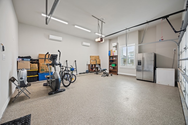 27927 Indigo Ridge Dr, Fulshear, TX 77441 - garage with stainless steel refrigerator with ice dispenser, an AC wall unit, fridge, and a garage door opener