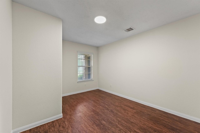 2611 Verano Dr, Richmond, TX 77406 - unfurnished room with dark wood-style flooring and baseboards