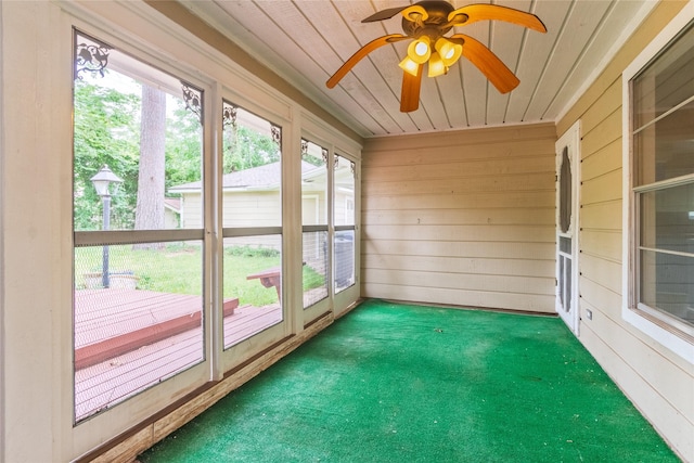 228 Hickory St, Huntsville, TX 77320 - unfurnished sunroom with healthy amount of natural light and a ceiling fan