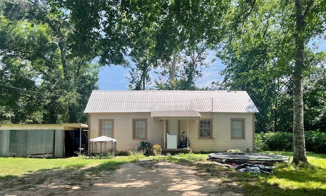 22606 Fm 359th Rd, Hempstead, TX 77445 - view of front of house with metal roof