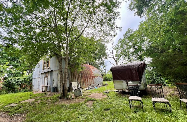22606 Fm 359th Rd, Hempstead, TX 77445 - view of yard featuring an outdoor structure and a barn