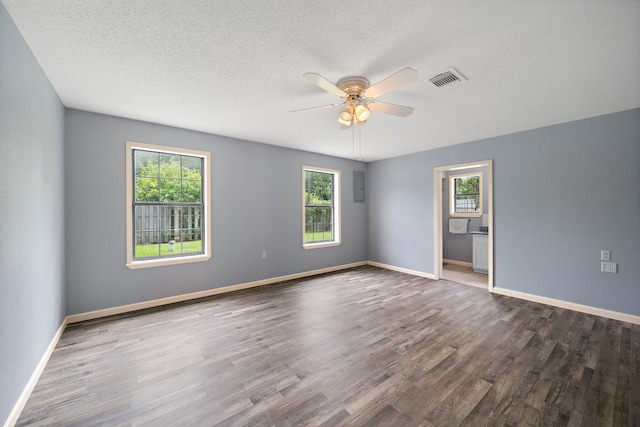 22307 Saddlewood Dr, Katy, TX 77449 - unfurnished room with ceiling fan, plenty of natural light, wood finished floors, a textured ceiling, and baseboards