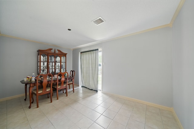 22307 Saddlewood Dr, Katy, TX 77449 - dining area with crown molding, baseboards, and light tile patterned floors