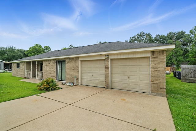 22307 Saddlewood Dr, Katy, TX 77449 - ranch-style house featuring brick siding, concrete driveway, and a garage