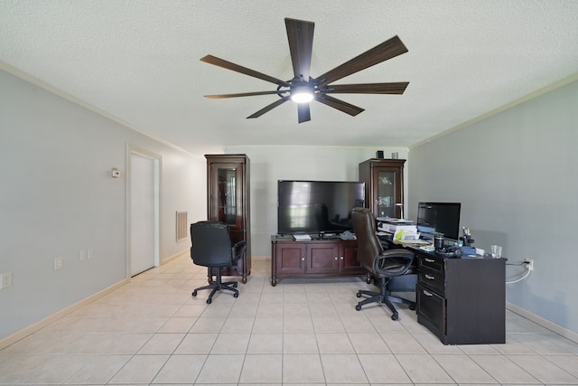 22307 Saddlewood Dr, Katy, TX 77449 - office area with ornamental molding, ceiling fan, a textured ceiling, light tile patterned floors, and baseboards