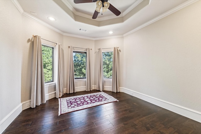 27521 Velvet Sky Way, Spring, TX 77386 - unfurnished room with healthy amount of natural light, a tray ceiling, hardwood / wood-style flooring, a ceiling fan, and ornamental molding