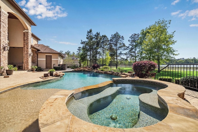 27521 Velvet Sky Way, Spring, TX 77386 - view of pool with a pool with connected hot tub and a patio area
