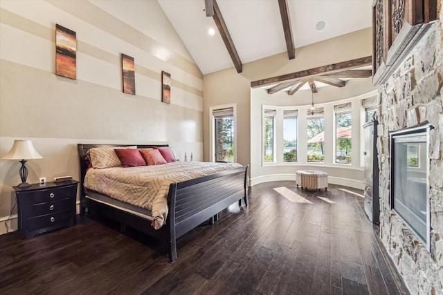 27521 Velvet Sky Way, Spring, TX 77386 - bedroom featuring hardwood / wood-style flooring, a stone fireplace, high vaulted ceiling, beamed ceiling, and baseboards