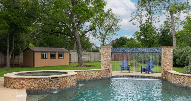7 Fort Graham Ct, Missouri City, TX 77459 - view of swimming pool with an outdoor structure and a pool with connected hot tub