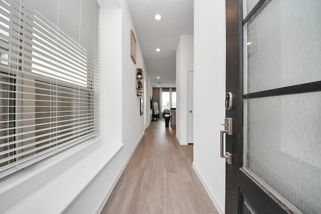 4214 Balboa Dr, Iowa Colony, TX 77583 - hallway featuring light wood-style flooring, recessed lighting, and baseboards