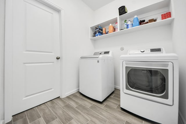 4214 Balboa Dr, Iowa Colony, TX 77583 - washroom featuring independent washer and dryer, wood finish floors, and baseboards