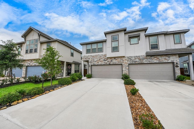 4214 Balboa Dr, Iowa Colony, TX 77583 - townhome / multi-family property featuring stone siding, concrete driveway, an attached garage, and board and batten siding