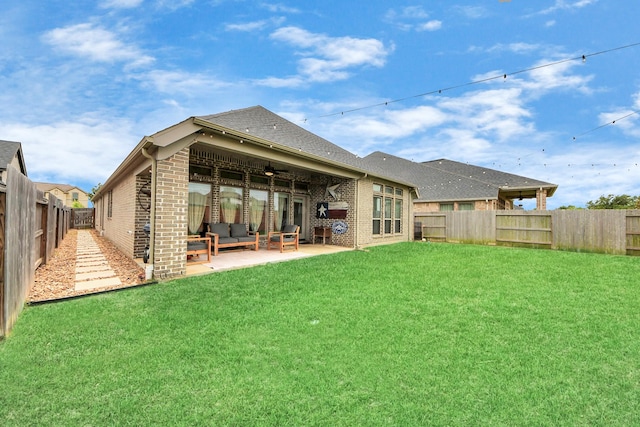 1311 Hudgins Pass, Richmond, TX 77469 - rear view of house featuring an outdoor living space, a ceiling fan, brick siding, a patio area, and a shingled roof