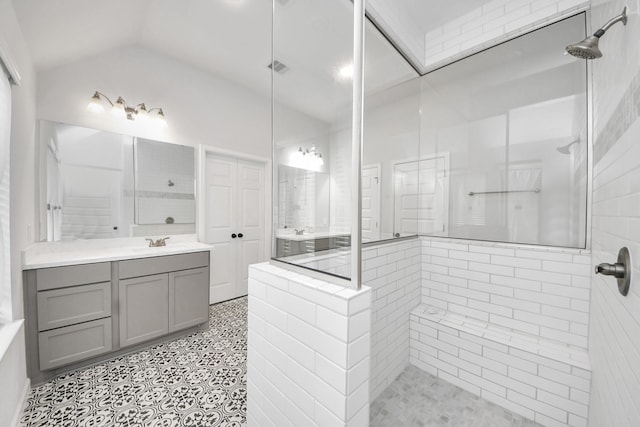 1311 Hudgins Pass, Richmond, TX 77469 - bathroom with walk in shower, vanity, and vaulted ceiling