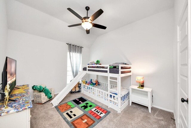 1311 Hudgins Pass, Richmond, TX 77469 - bedroom with carpet flooring, lofted ceiling, baseboards, and a ceiling fan
