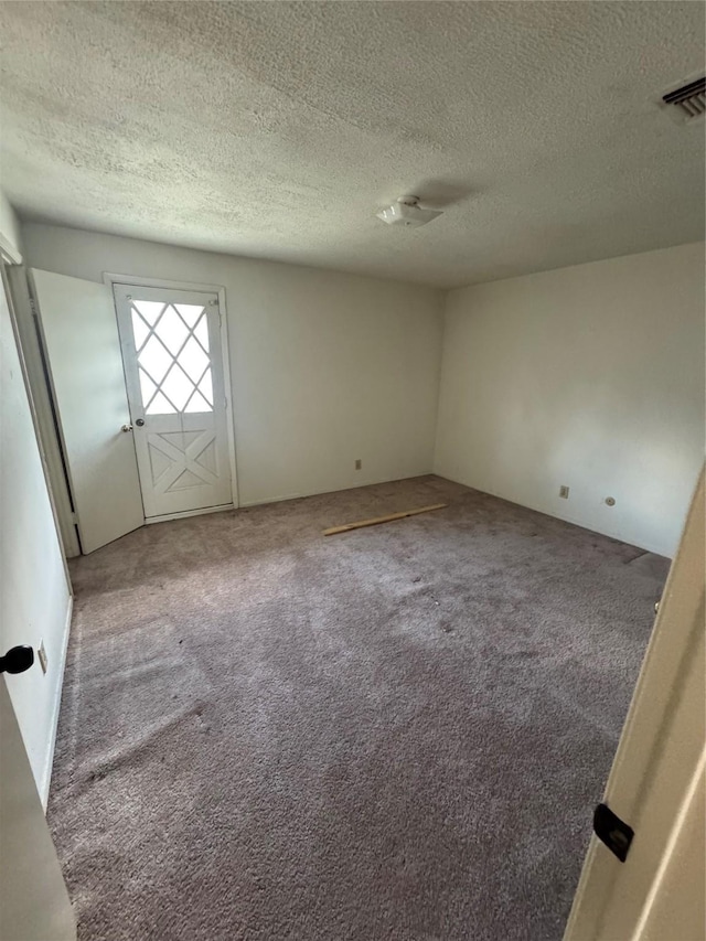 355 Audrey Ln Unit 355, Houston, TX 77015 - spare room with carpet floors and a textured ceiling