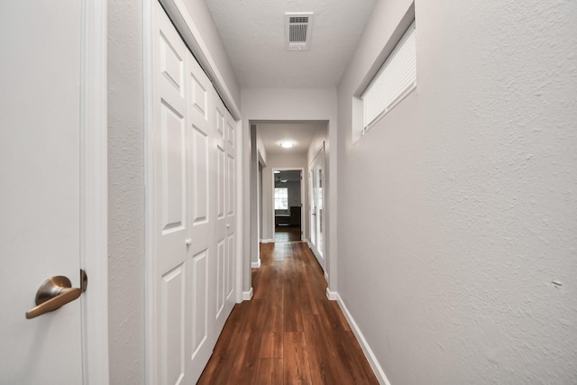 3111 Tanglebriar Dr, Pasadena, TX 77503 - hall with dark wood finished floors and baseboards