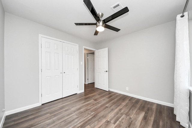 3111 Tanglebriar Dr, Pasadena, TX 77503 - unfurnished bedroom featuring baseboards, wood finished floors, a closet, and ceiling fan