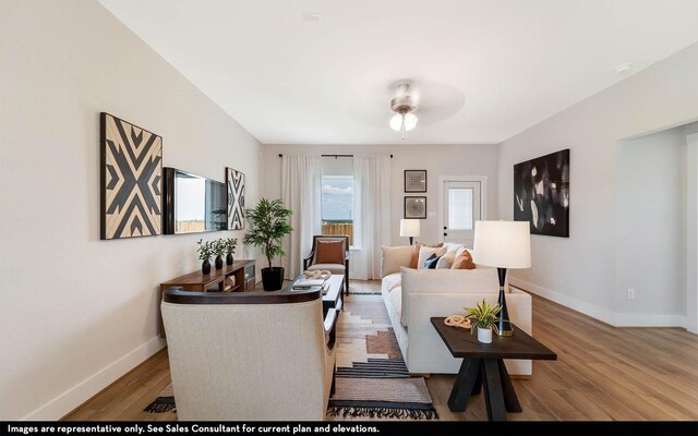 3644 Crosspointe Pass, Angleton, TX 77515 - living room with baseboards, wood finished floors, and a ceiling fan