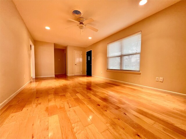 4834 Sanford Rd, Houston, TX 77035 - empty room featuring light wood-style flooring, ceiling fan, recessed lighting, and baseboards