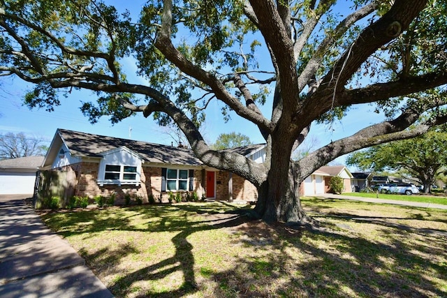 4834 Sanford Rd, Houston, TX 77035 - view of front of property featuring a front lawn and brick siding