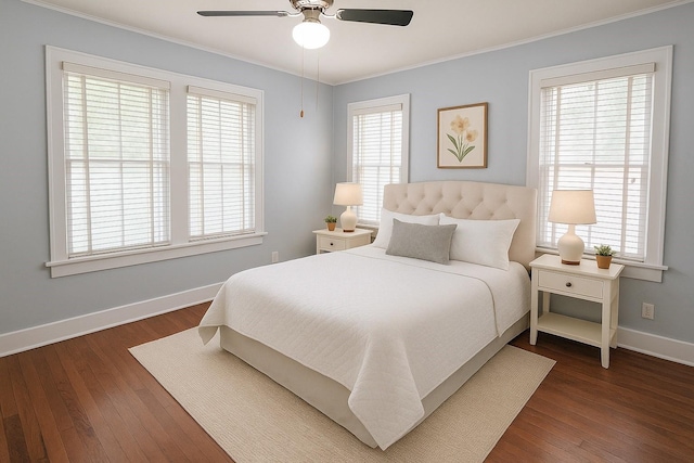 1514 Laurel St, La Marque, TX 77568 - bedroom with baseboards, crown molding, dark wood finished floors, and a ceiling fan