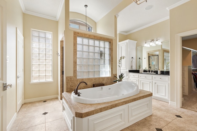 23 Lochbury Dr, Spring, TX 77379 - bathroom featuring a whirlpool tub, vanity, tile patterned flooring, ornamental molding, and baseboards