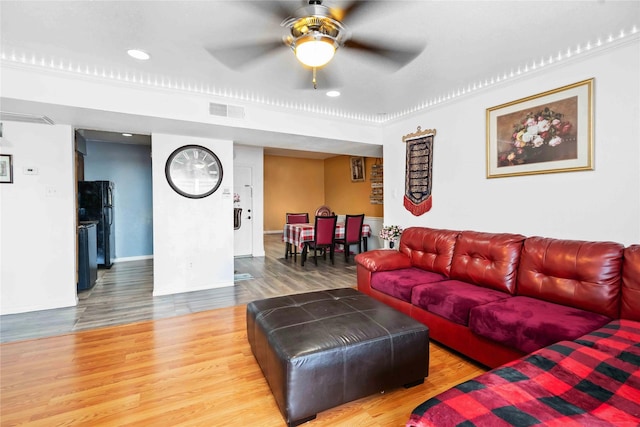 3015 Walnut Bend Ln Unit 37, Houston, TX 77042 - living area featuring a ceiling fan, wood finished floors, baseboards, and recessed lighting