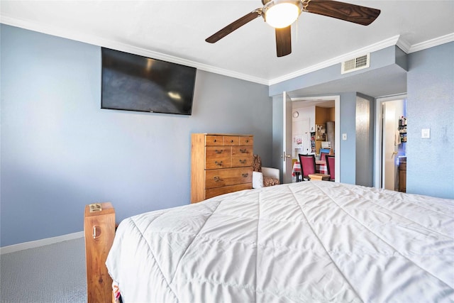 3015 Walnut Bend Ln Unit 37, Houston, TX 77042 - carpeted bedroom with crown molding, ceiling fan, and baseboards
