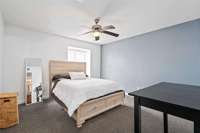 3015 Walnut Bend Ln Unit 37, Houston, TX 77042 - bedroom with dark carpet, baseboards, and a ceiling fan