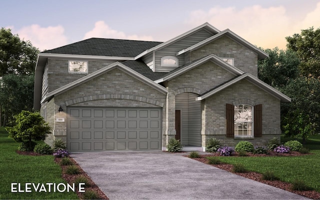1722 Navigation Ln, Angleton, TX 77515 - view of front facade with driveway, a front yard, brick siding, and an attached garage