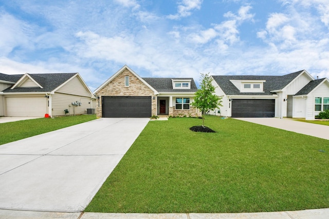 31811 Whittis Hill Way, Fulshear, TX 77441 - view of front facade with concrete driveway, a front yard, and central AC unit