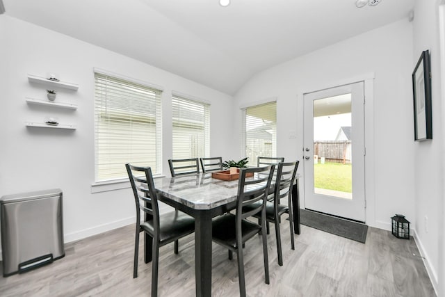 31811 Whittis Hill Way, Fulshear, TX 77441 - dining space featuring vaulted ceiling, light wood-style flooring, and baseboards