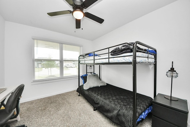 31811 Whittis Hill Way, Fulshear, TX 77441 - carpeted bedroom with baseboards, a desk, and a ceiling fan