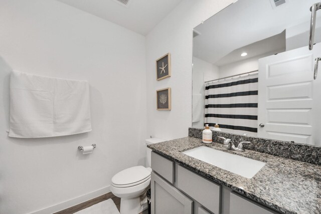 31811 Whittis Hill Way, Fulshear, TX 77441 - bathroom with vanity, toilet, baseboards, and a shower with curtain