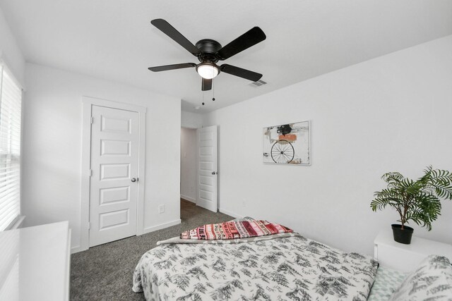 31811 Whittis Hill Way, Fulshear, TX 77441 - carpeted bedroom with baseboards and a ceiling fan