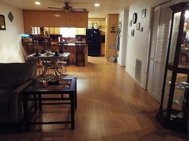 257 Barracuda, Bayou Vista, TX 77563 - living room with a ceiling fan, light wood-style flooring, and recessed lighting