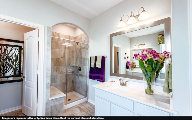 1726 Navigation Ln, Angleton, TX 77515 - bathroom with a stall shower, vanity, and baseboards