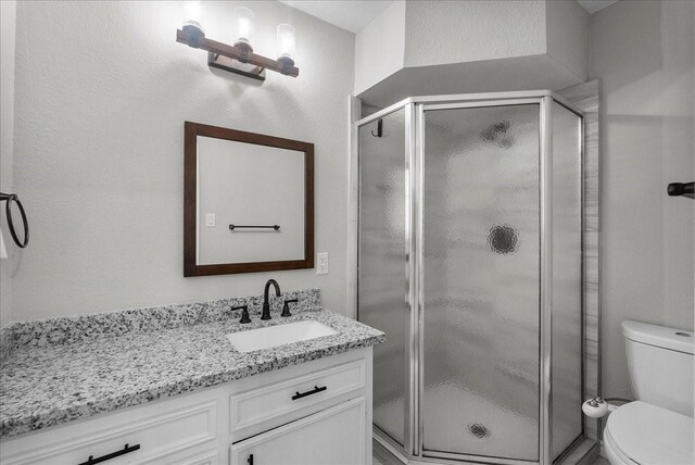 12153 24th St, Santa Fe, TX 77510 - full bathroom with toilet, vanity, and a shower stall