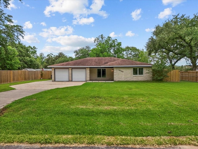 12153 24th St, Santa Fe, TX 77510 - single story home featuring concrete driveway and a garage