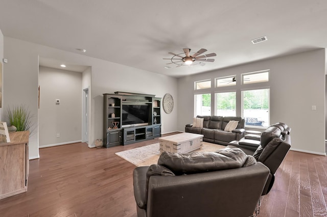 9175 White Tail Dr, Conroe, TX 77303 - living room with a ceiling fan, wood finished floors, and baseboards